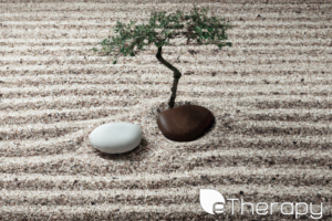 A tranquil scene of a Zen garden with carefully raked sand - How Can Mindfulness Bring Peace to My Life