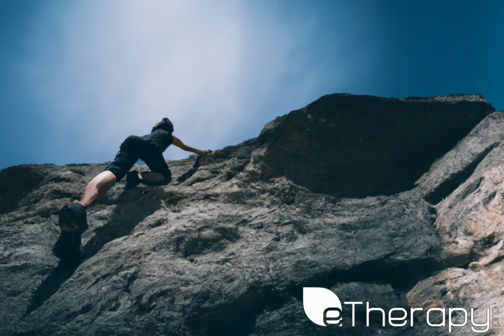 A person climbing a rocky hill - Overthinking Are We Fueling Our Own Anxiety Cycles